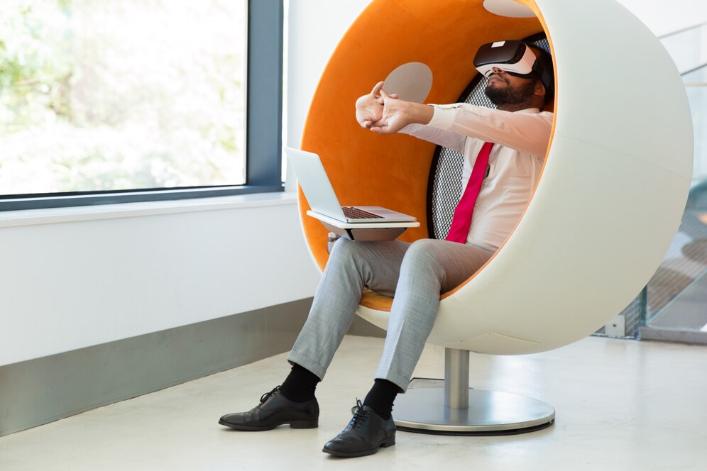 Man in corporate attire wearing VR